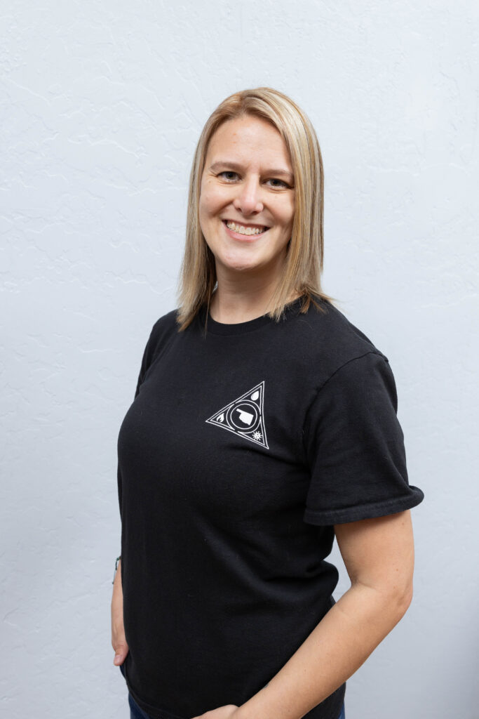 Professional team member of a woman-owned restoration contractor providing water removal services as part of a trusted water mitigation company.